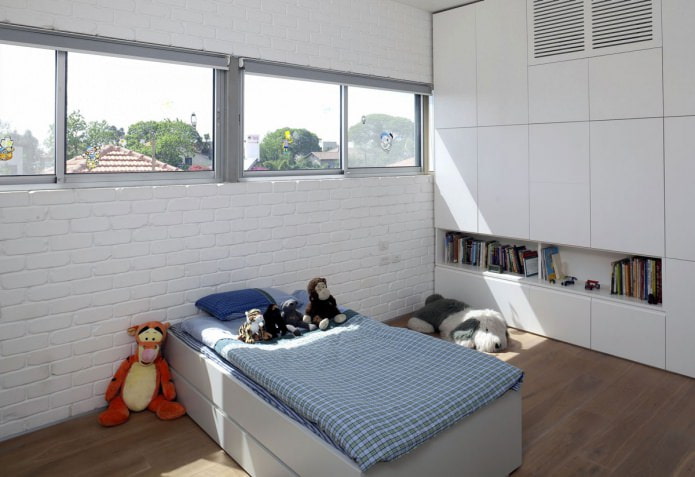 white brick in the interior of the children's room