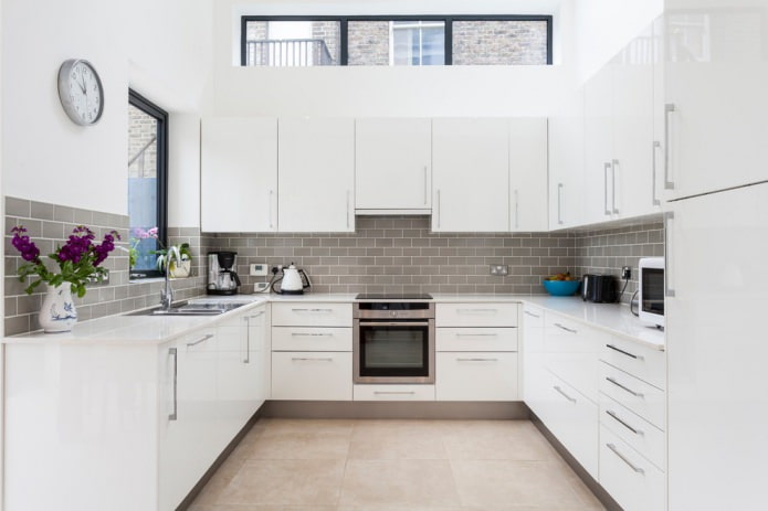 white square kitchen with a contrasting apron