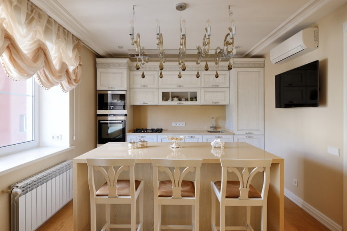furniture and appliances in the kitchen interior in beige tones