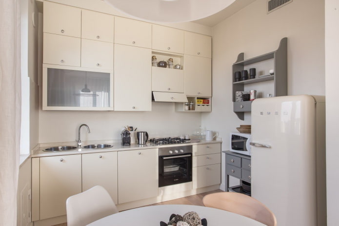 furniture and appliances in the kitchen interior in beige tones