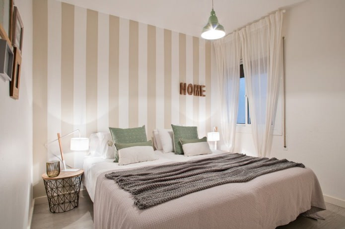 milk-colored curtains with beige wallpaper in the bedroom interior