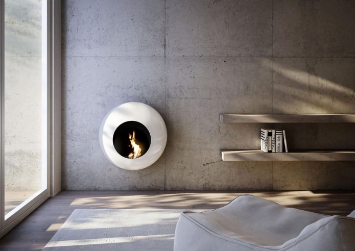 a round bio-fireplace in the living room interior
