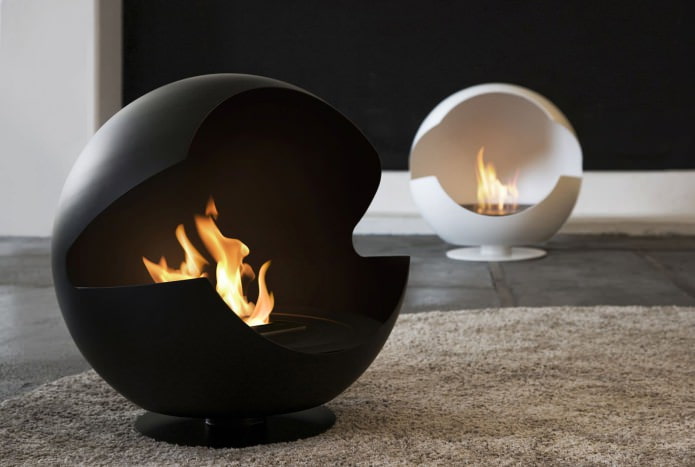 a round freestanding bio-fireplace in the living room interior