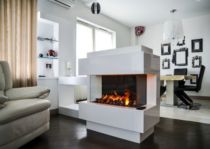 the fireplace divides the room into two zones