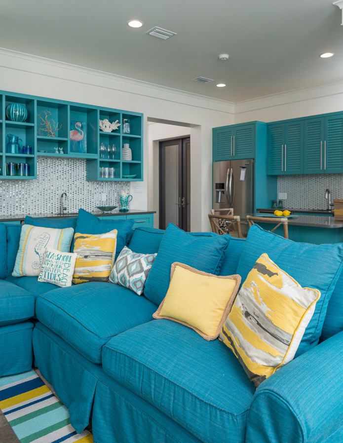 turquoise kitchen combined with a living room