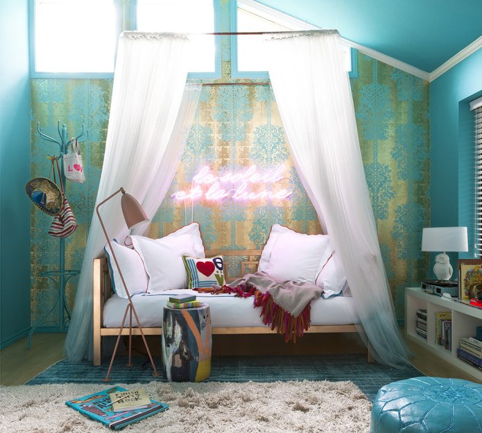 an accent wall with a gold print