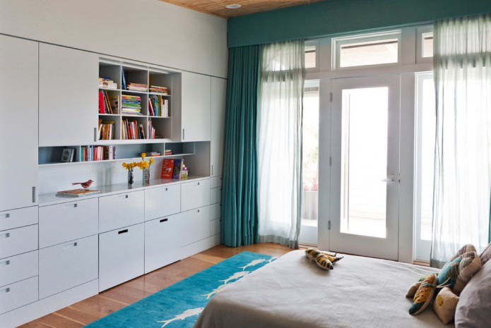 Interior in white tones with turquoise curtains