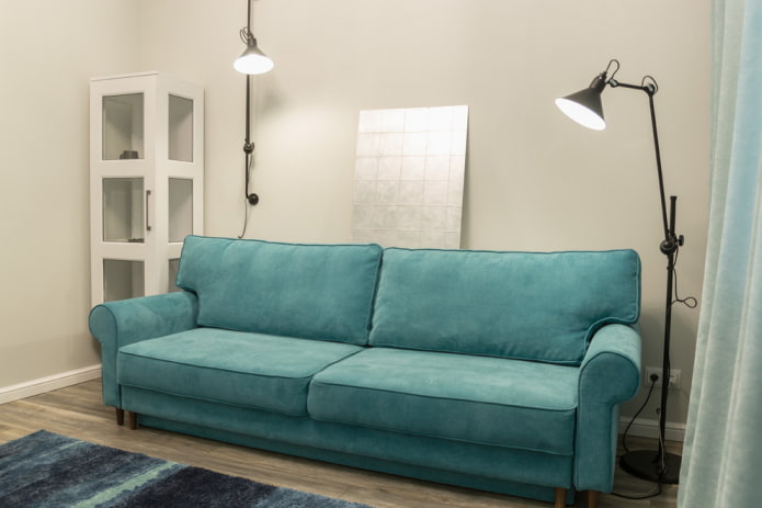straight turquoise sofa in the interior