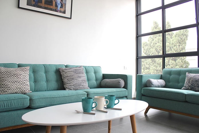 sofa with turquoise fabric upholstery in the interior