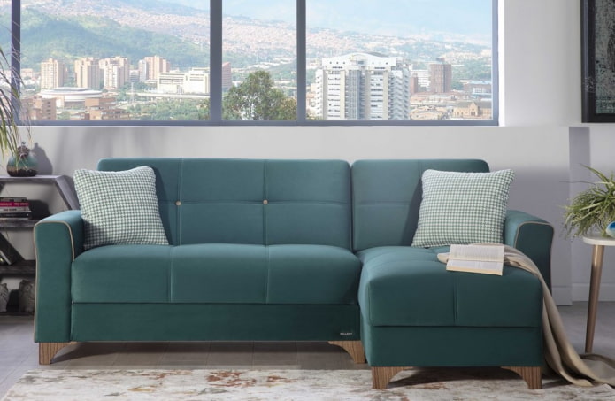 dark turquoise sofa in the interior