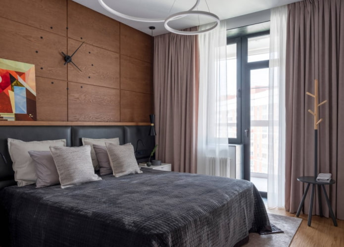 clock above the bed