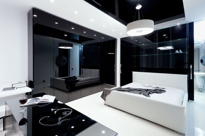 furniture in the interior of the bedroom in black and white tones