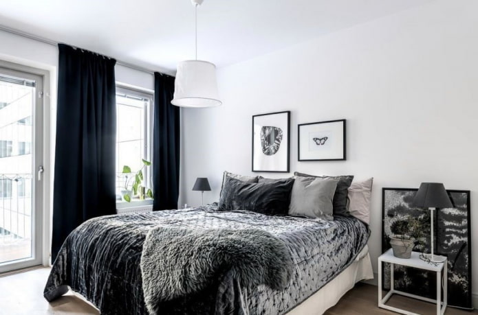 textiles in the bedroom interior in black and white tones