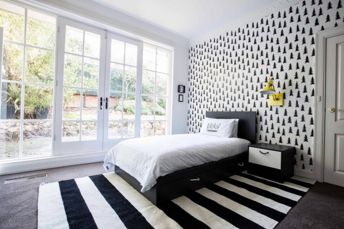 textiles in the bedroom interior in black and white tones