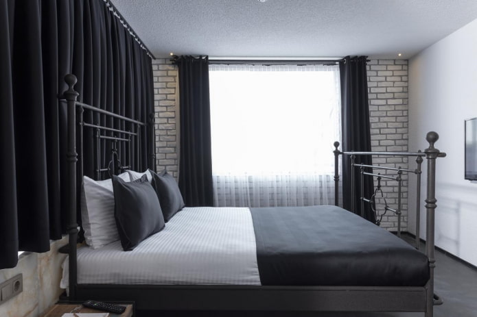 furniture in the bedroom interior in black and white tones