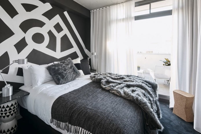 textiles in the bedroom interior in black and white tones