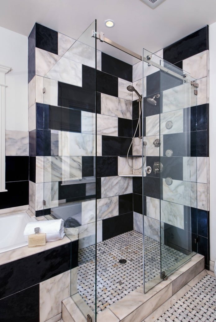 Black and white tiles in a staggered pattern