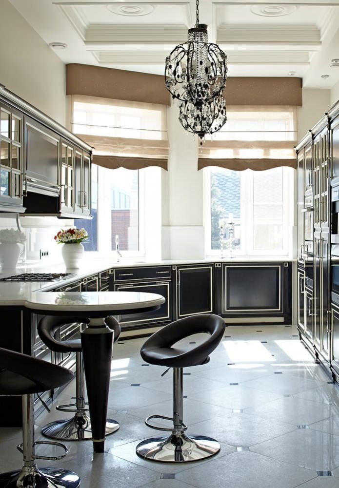 kitchen with black furniture and light walls