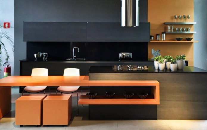 Black kitchen set with orange countertop