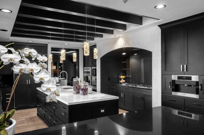 gray wallpaper in the kitchen with black furniture