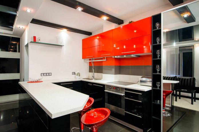 Black and orange kitchen set with a bar counter