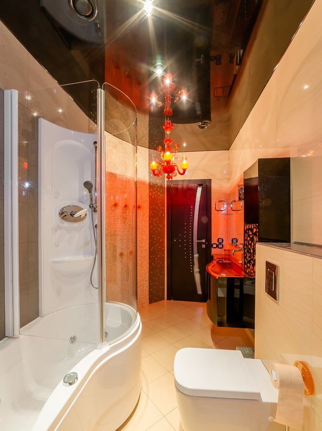 glossy black stretch ceiling in the bathroom