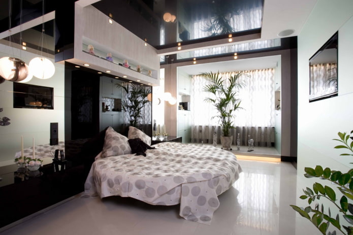 glossy black stretch ceiling in the bedroom