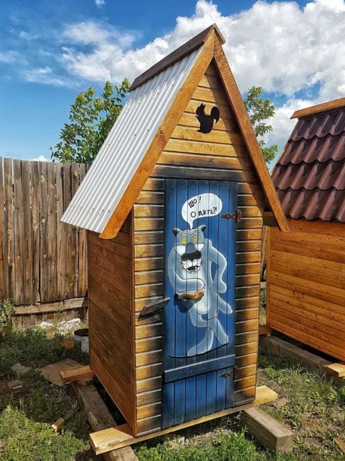 country toilet with a drawing