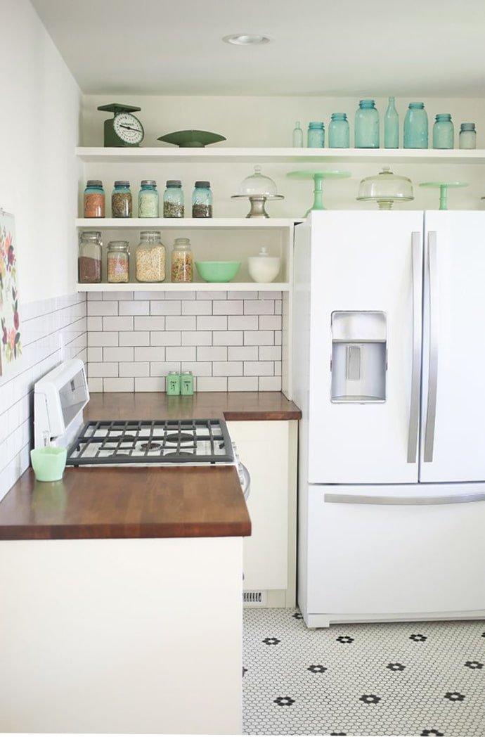 Open shelves above the refrigerator
