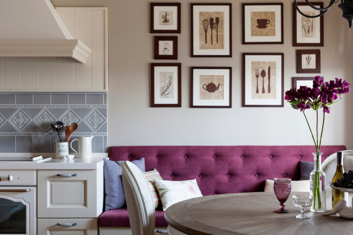 paintings on the wall in the kitchen interior