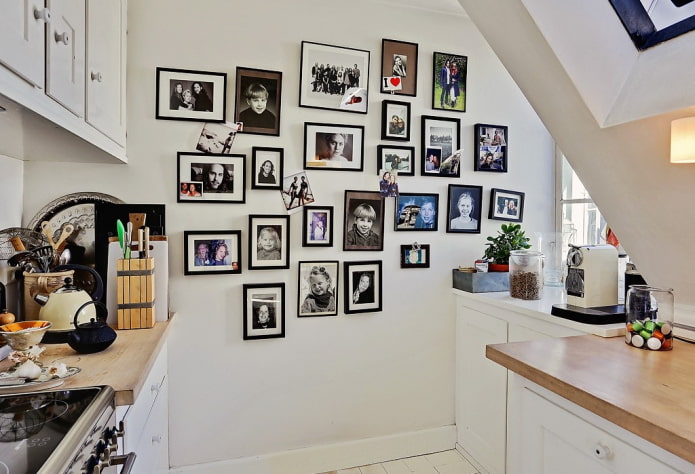 photos on the wall in the kitchen interior