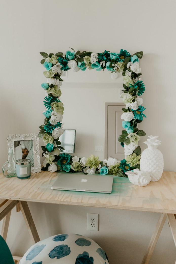 mirror decorated with flowers in the interior