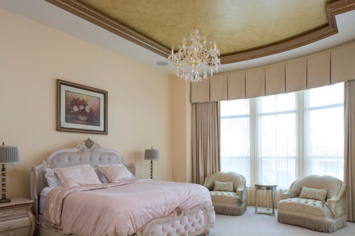 plaster on the ceiling in the bedroom interior