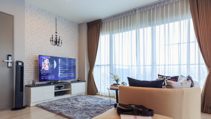 White brick-like wallpaper in living room design
