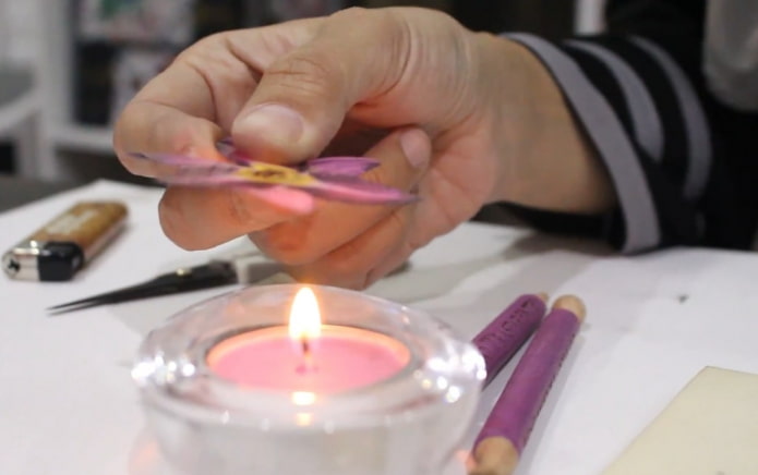 hold over a candle