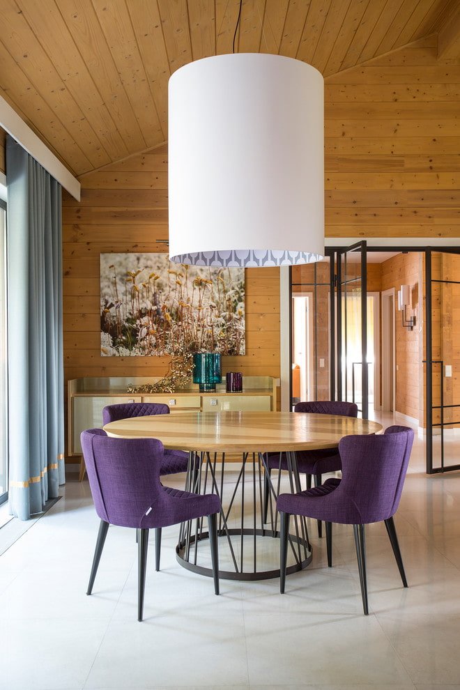 wooden table with a metal base in the interior
