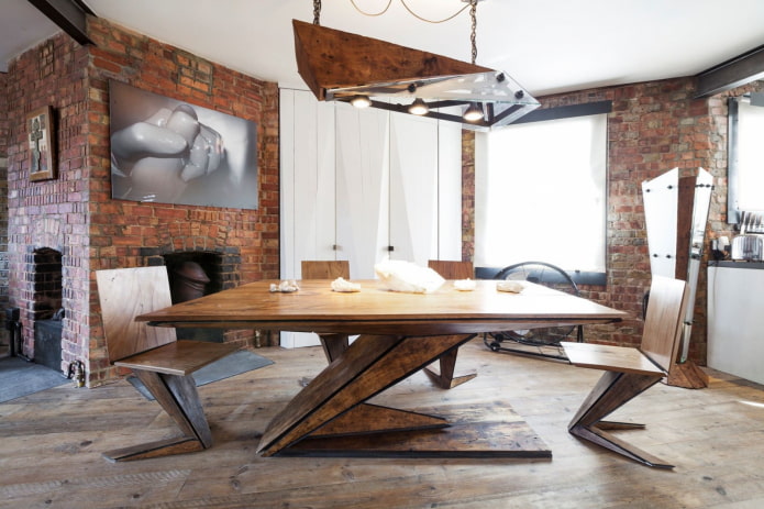 wooden table in the interior in loft style