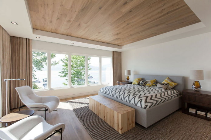 parquet board on the ceiling in the bedroom interior
