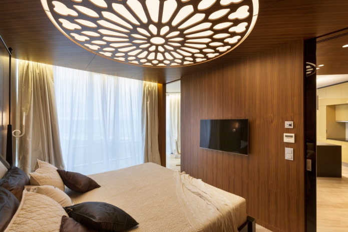 carved wooden ceiling in the bedroom
