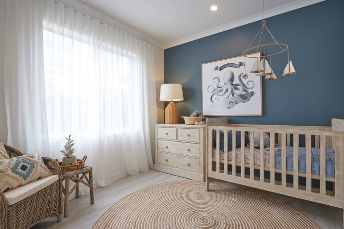 design of a nursery for a newborn in a marine style