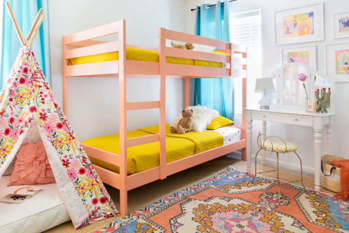 pink bunk bed in a nursery