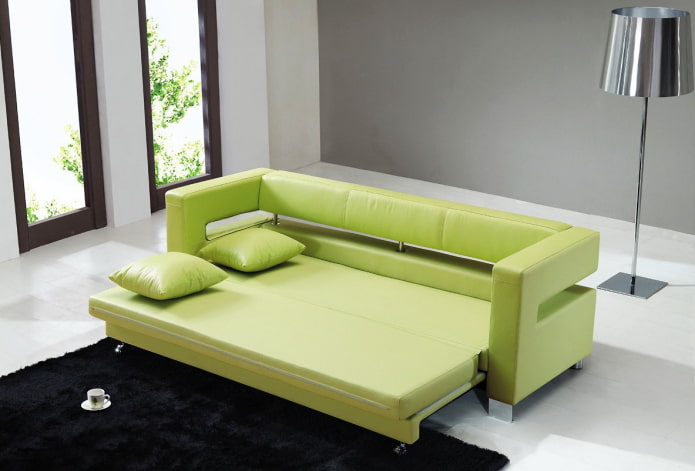 green sofa bed in the interior