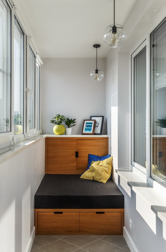 sofa with storage drawers on the loggia