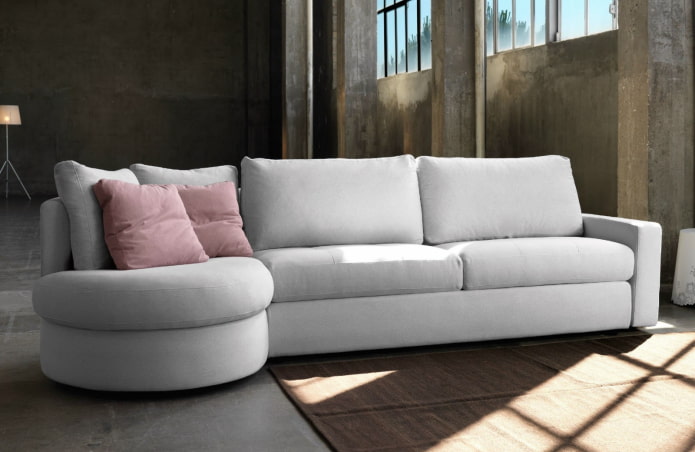 sofa model with a white ottoman in the interior
