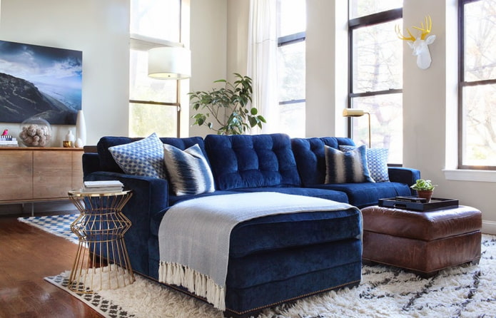 fabric sofa model with an ottoman in the interior