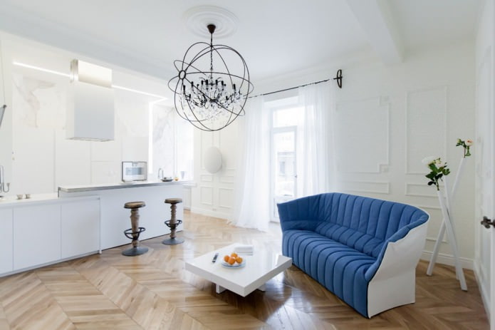 Interior of a combined kitchen-living room with a bar counter