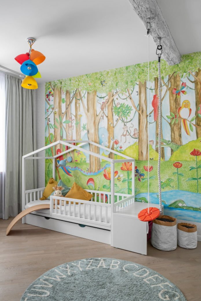 paintings on the wall in the nursery