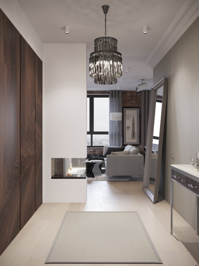 design of a hallway combined with a living room with a fireplace