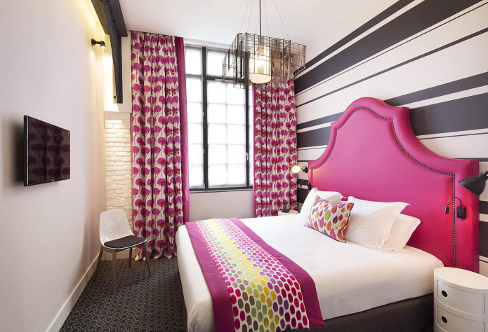 black and white striped wallpaper on the wall in the bedroom