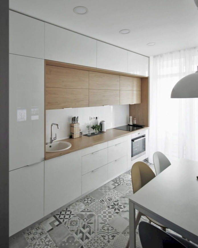 cabinets to the ceiling in the kitchen